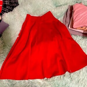 Unique vintage red swing skirt, like new. Figure flattering. Size XS